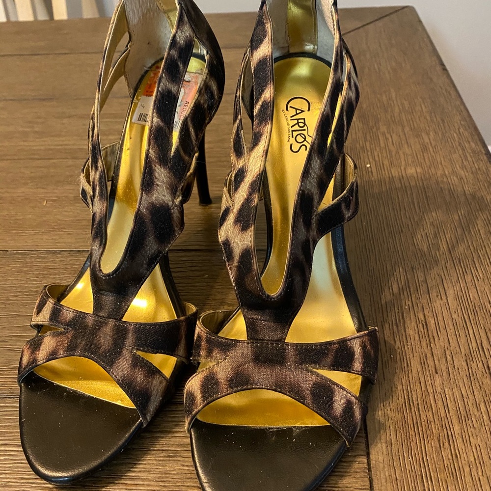 Like new Carlos Santana heels. Has zipper back.